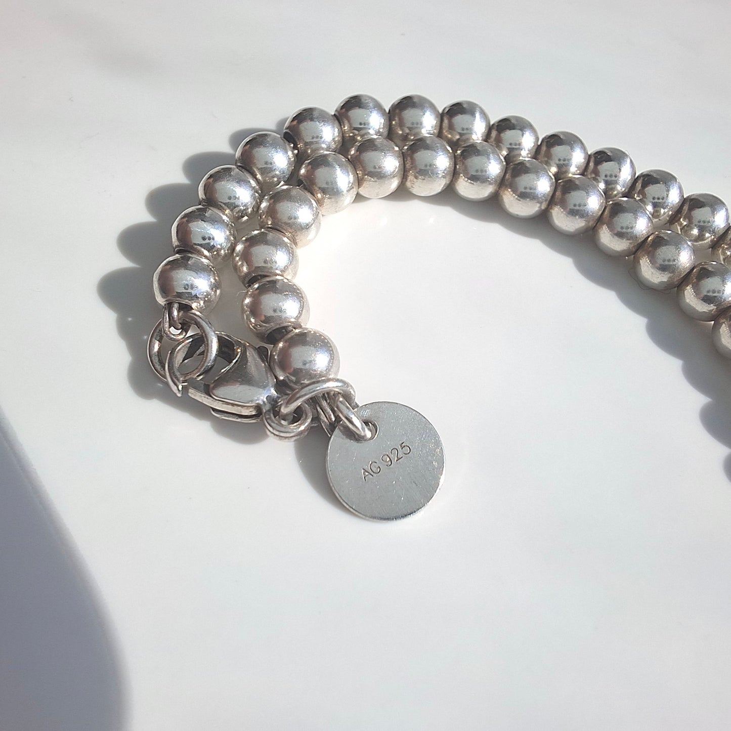 Return to Tiffany Sterling Silver Beaded Bracelet With Pink Enamel Heart Charm Tag