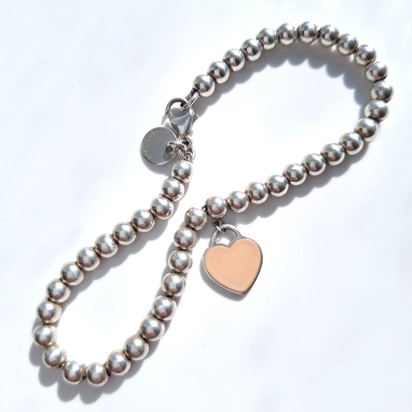 Return to Tiffany Sterling Silver Beaded Bracelet With Pink Enamel Heart Charm Tag