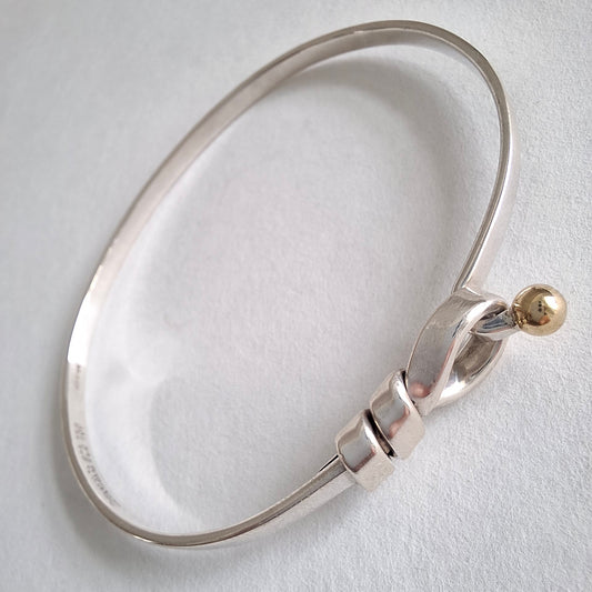 Vintage Tiffany & Co Love Knot Bracelet in Hallmarked Sterling Silver with 18k Gold Detail