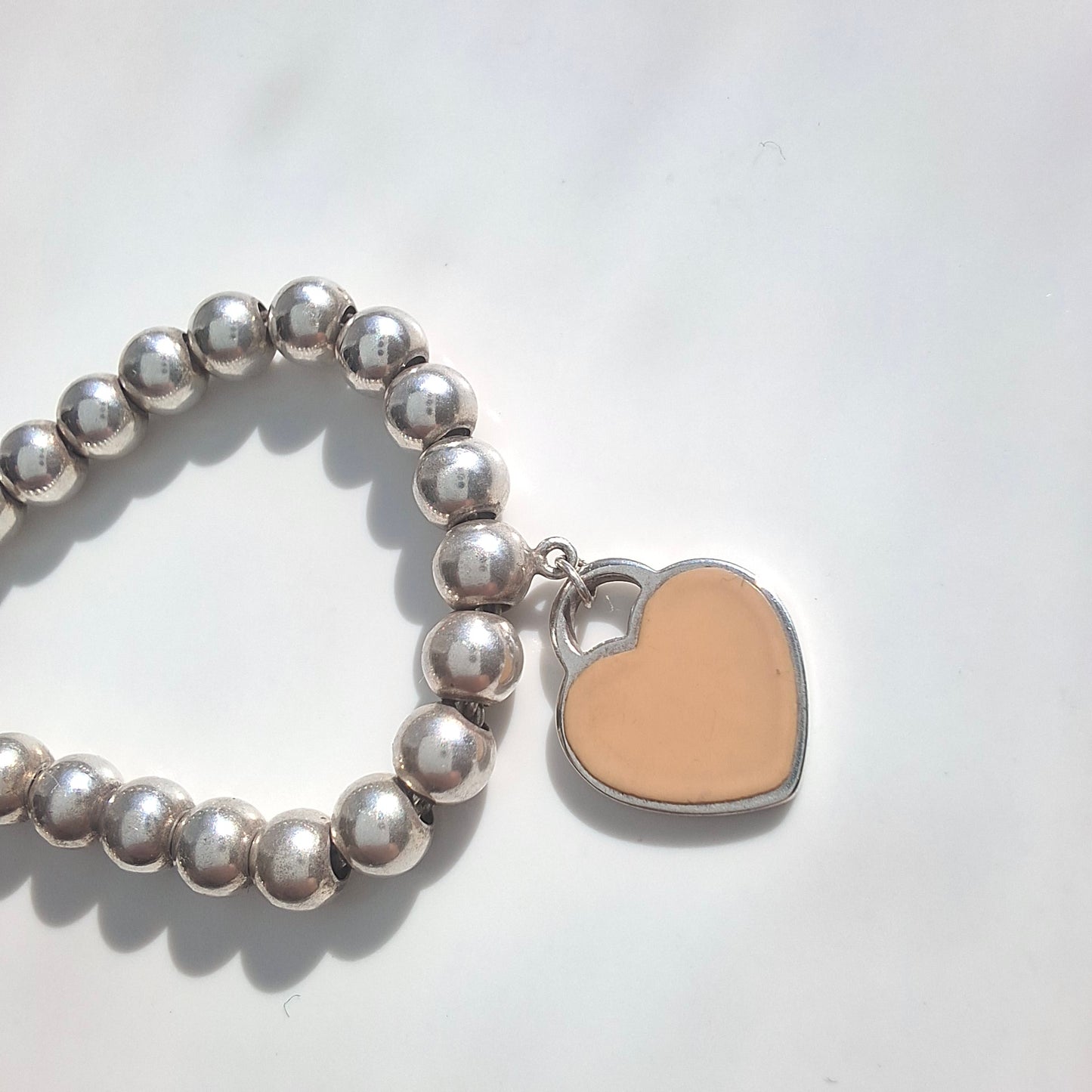 Return to Tiffany Sterling Silver Beaded Bracelet With Pink Enamel Heart Charm Tag