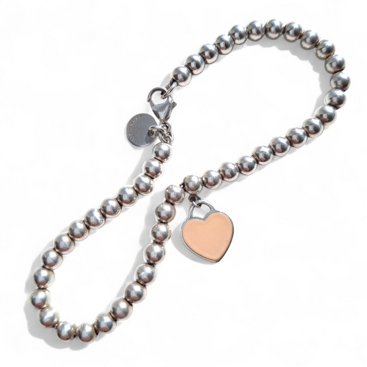 Return to Tiffany Sterling Silver Beaded Bracelet With Pink Enamel Heart Charm Tag