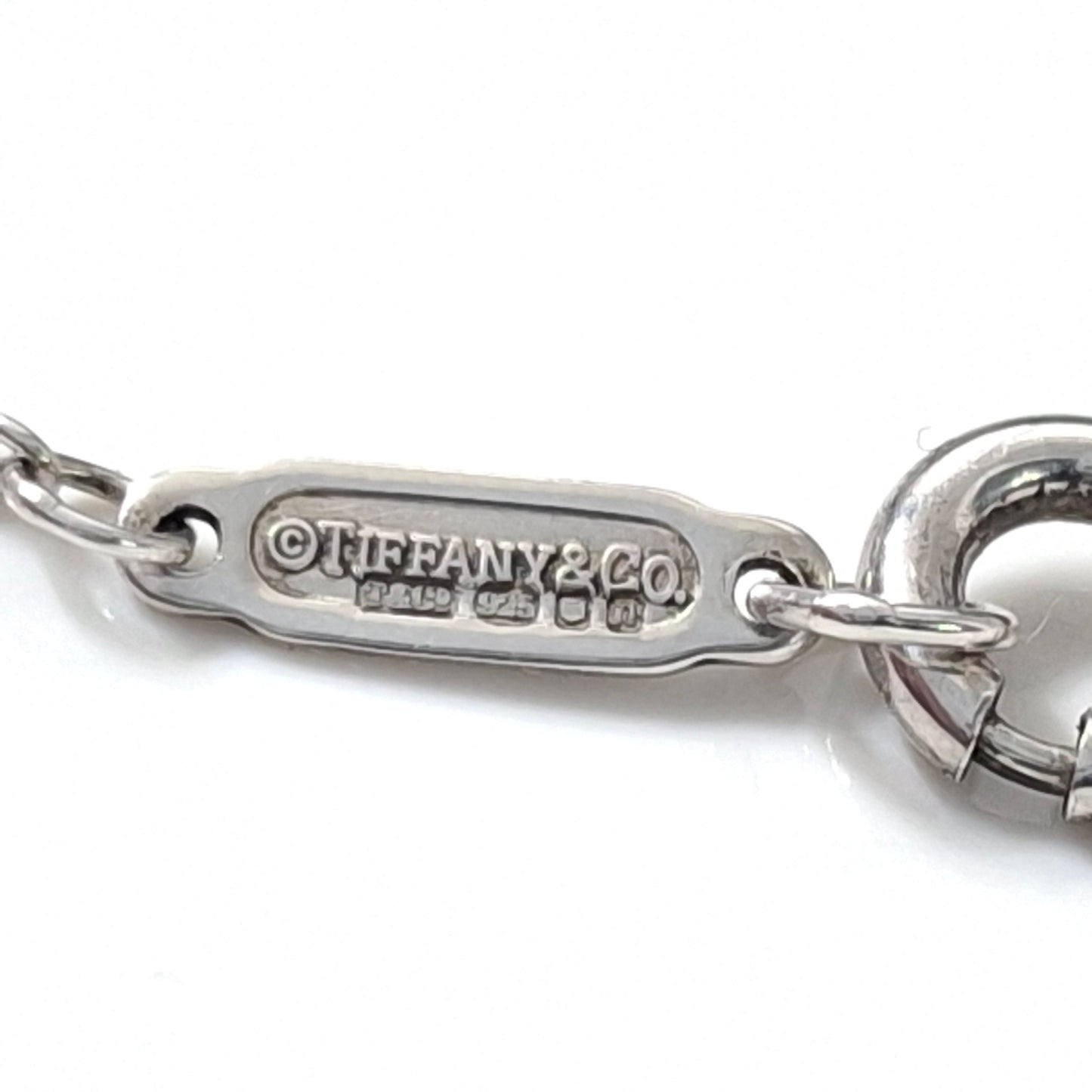 2012 Tiffany & Co 1837 Rubedo and Hallmarked 925 Sterling Silver Interlocking Circles Four Ring Pendant Necklace