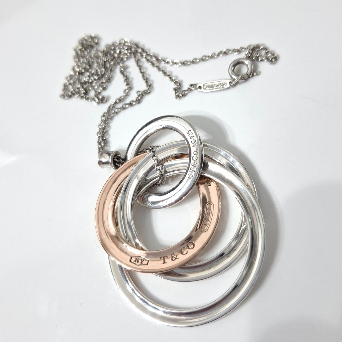 2012 Tiffany & Co 1837 Rubedo and Hallmarked 925 Sterling Silver Interlocking Circles Four Ring Pendant Necklace