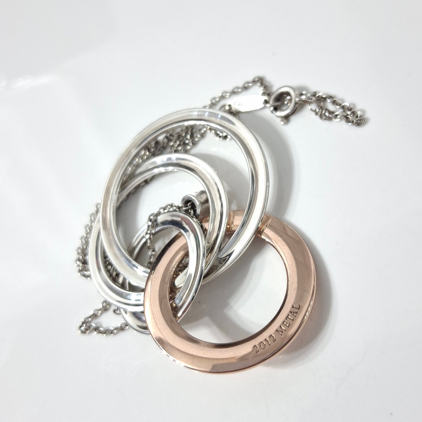 2012 Tiffany & Co 1837 Rubedo and Hallmarked 925 Sterling Silver Interlocking Circles Four Ring Pendant Necklace