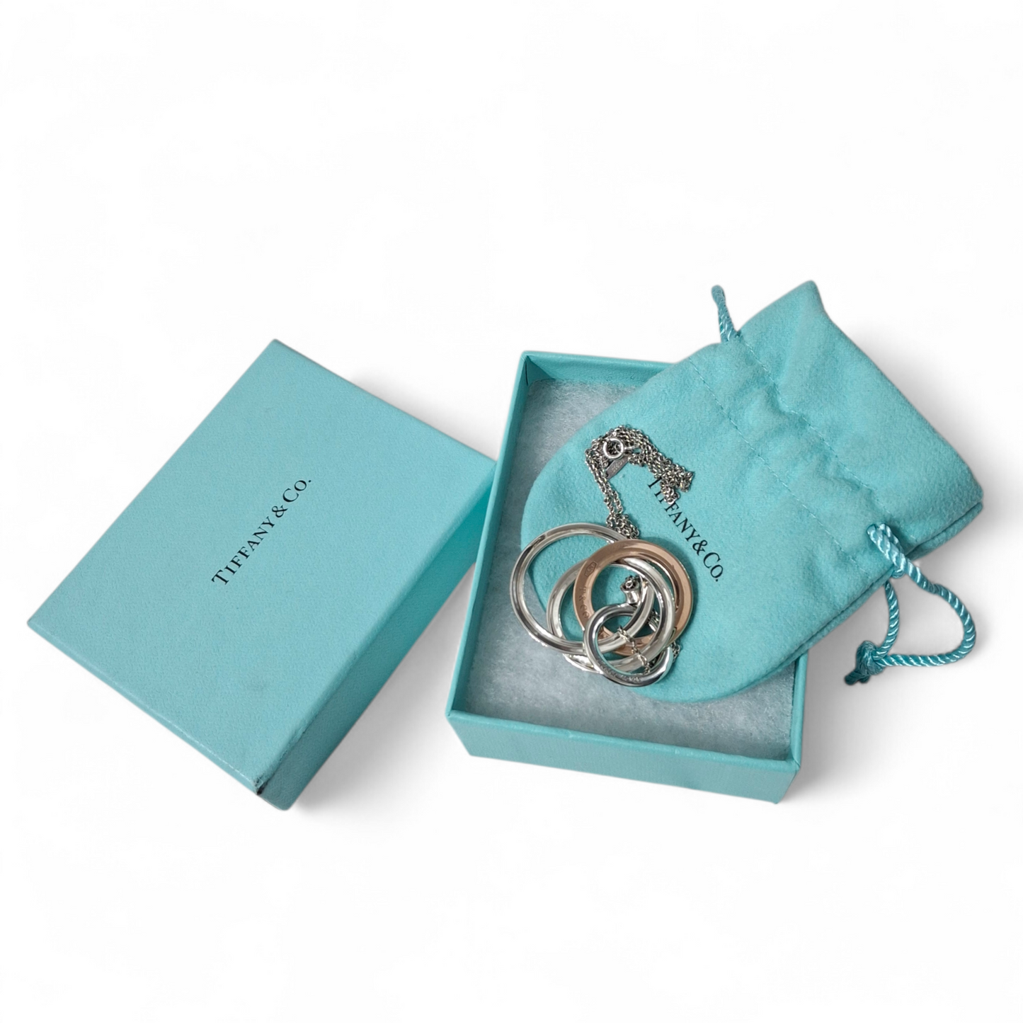 2012 Tiffany & Co 1837 Rubedo and Hallmarked 925 Sterling Silver Interlocking Circles Four Ring Pendant Necklace