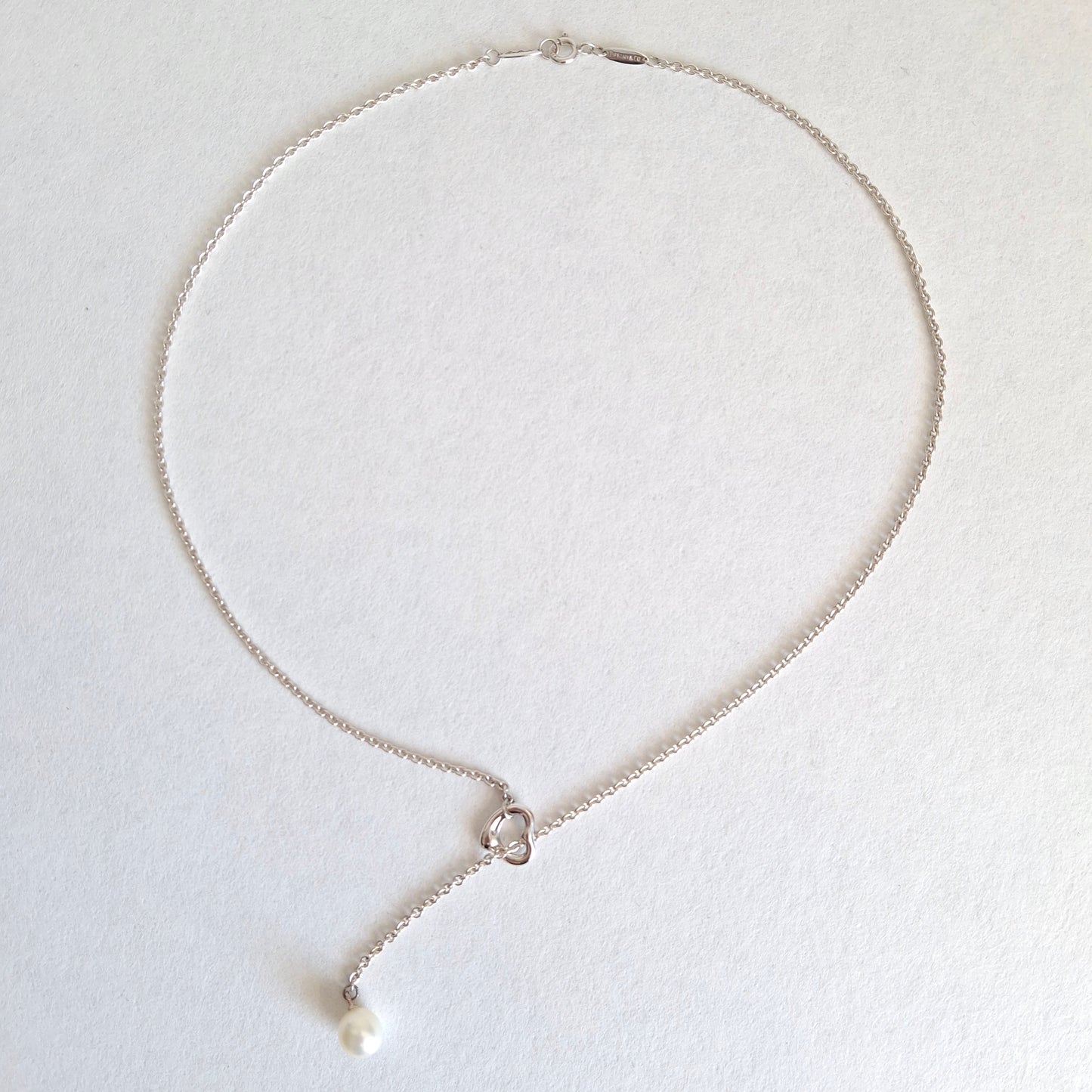 Tiffany & Co. Elsa Peretti Design Open Heart Lariat Necklace in Silver with a Pearl