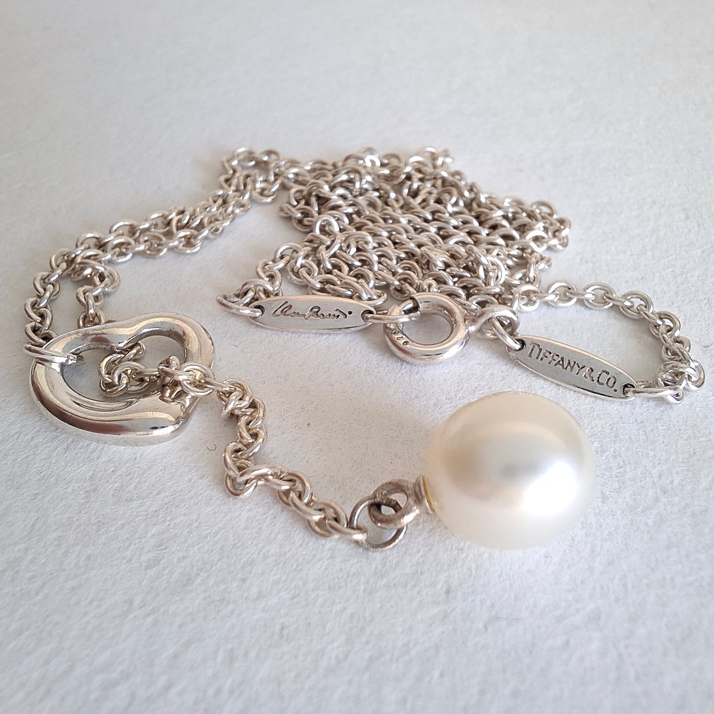 Tiffany & Co. Elsa Peretti Design Open Heart Lariat Necklace in Silver with a Pearl