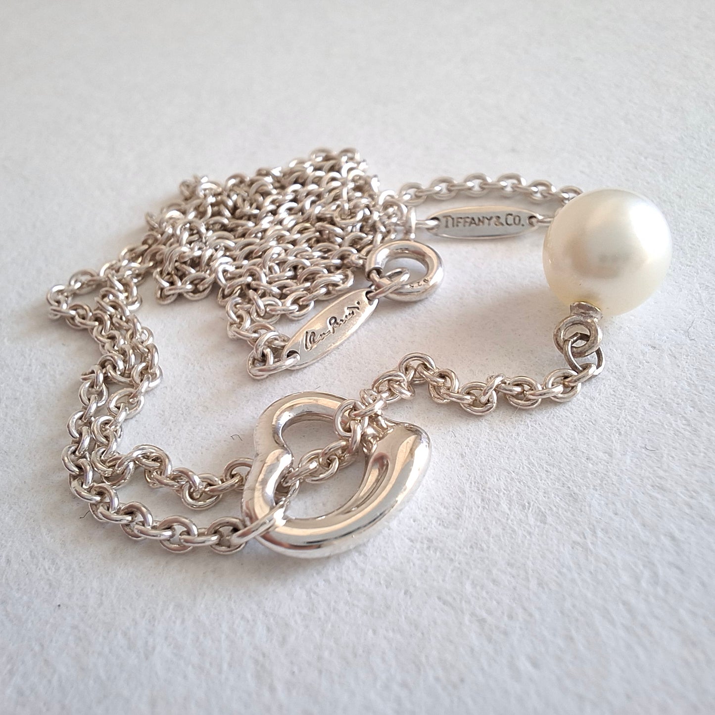 Tiffany & Co. Elsa Peretti Design Open Heart Lariat Necklace in Silver with a Pearl