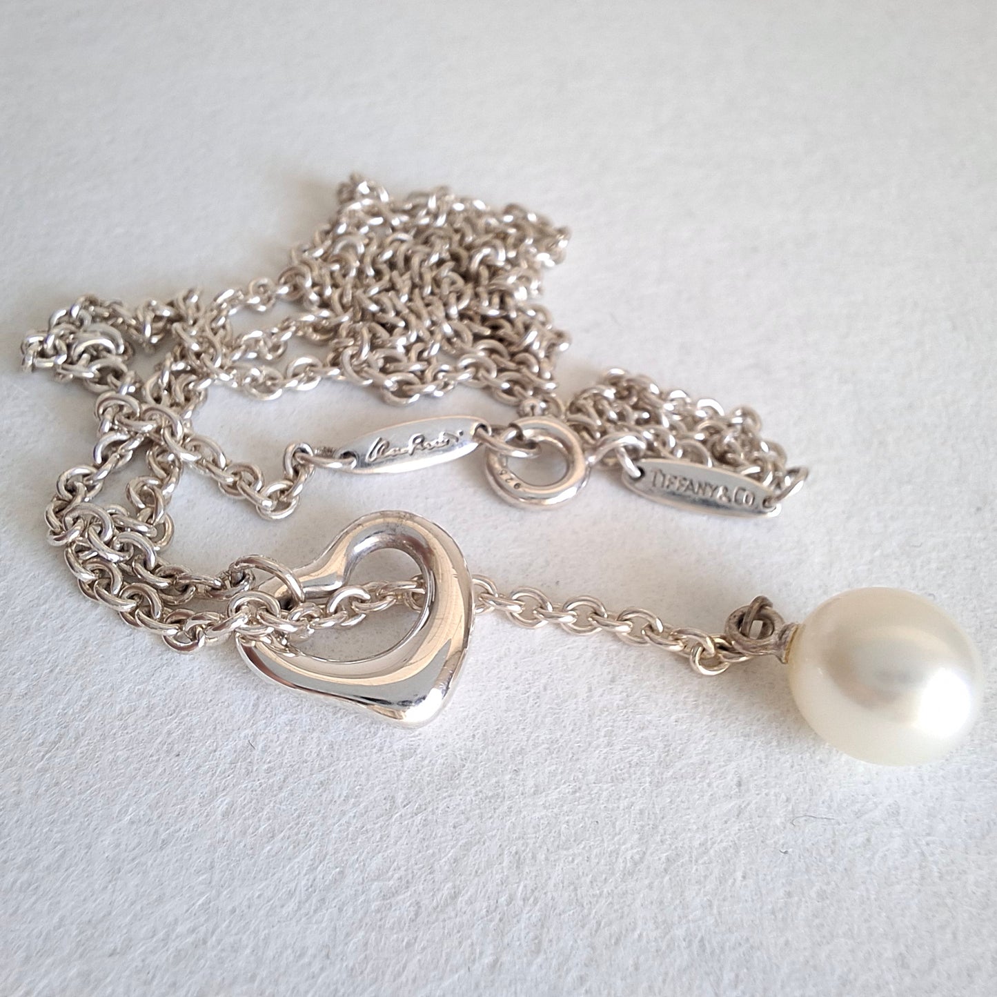 Tiffany & Co. Elsa Peretti Design Open Heart Lariat Necklace in Silver with a Pearl