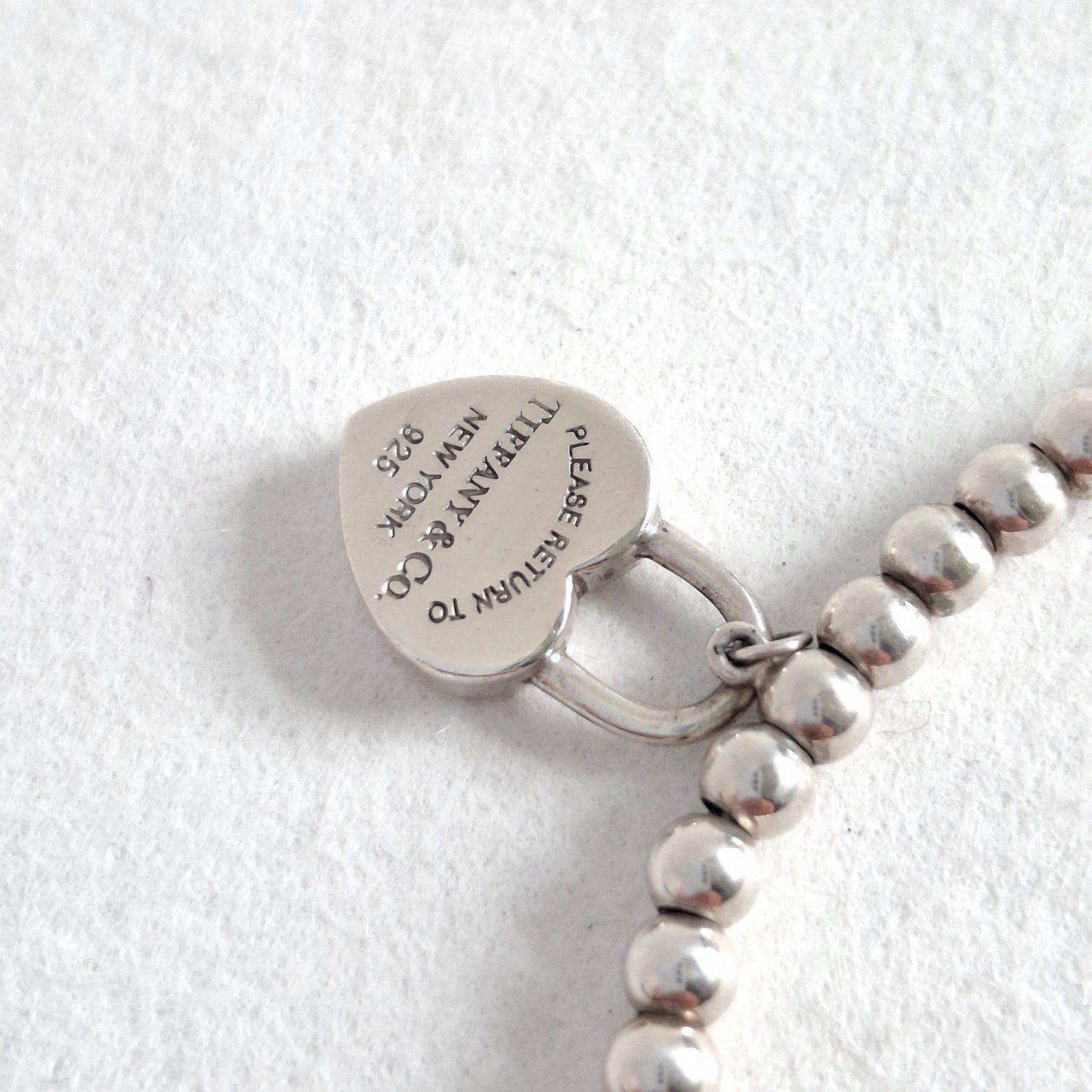 Return to Tiffany & Co 3mm Bead Bracelet with Mini Heart Padlock  Charm