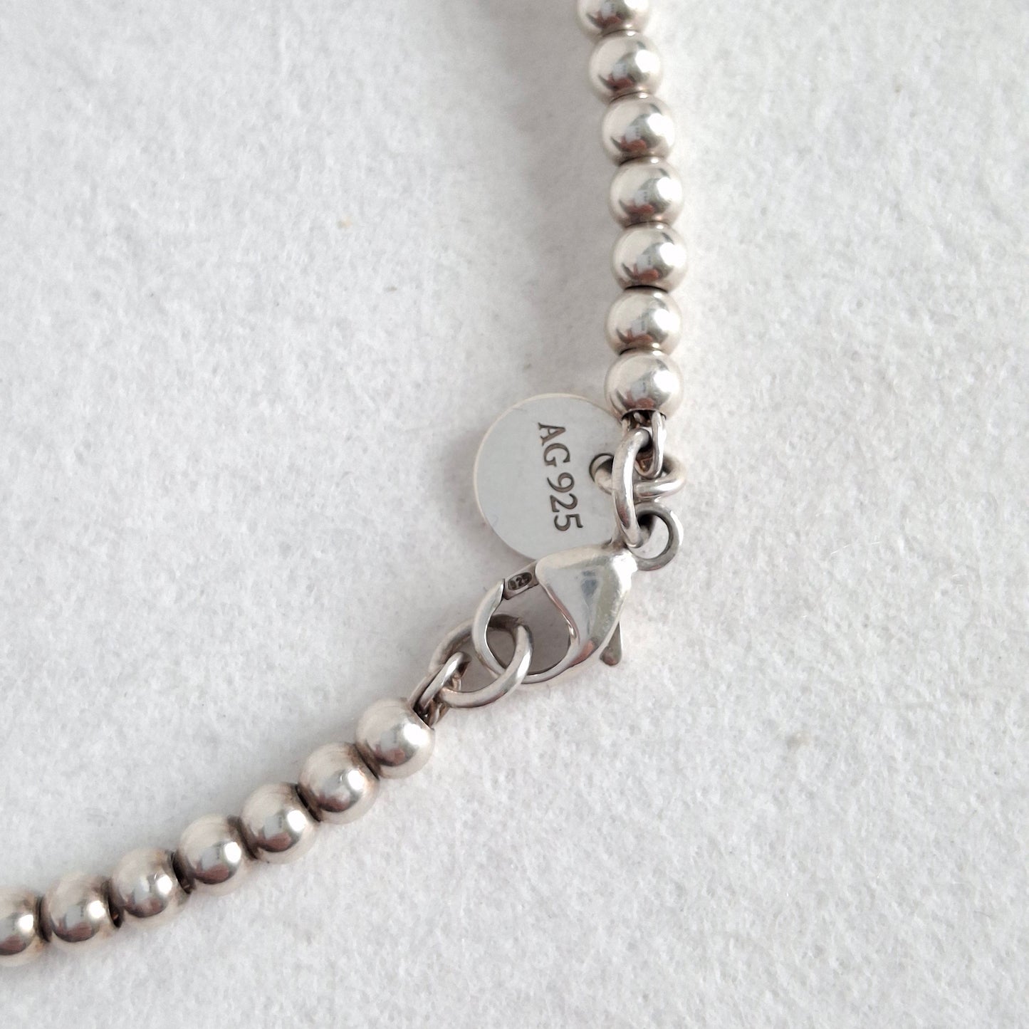 Return to Tiffany & Co 3mm Bead Bracelet with Mini Heart Padlock  Charm