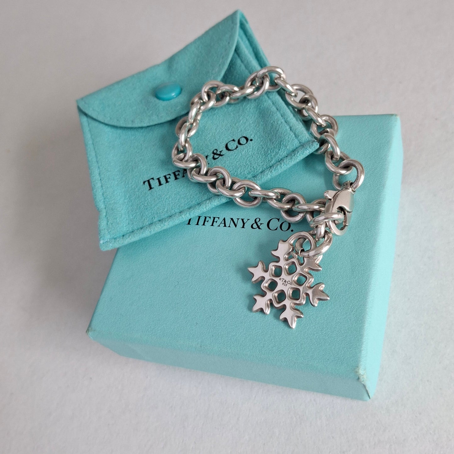 Vintage Tiffany & Co Snowflake Charm Bracelet in Hallmarked Sterling Silver with Box and Pouch