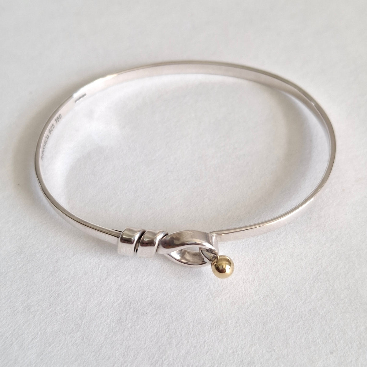 Vintage Tiffany & Co Love Knot Bracelet in Hallmarked Sterling Silver with 18k Gold Detail