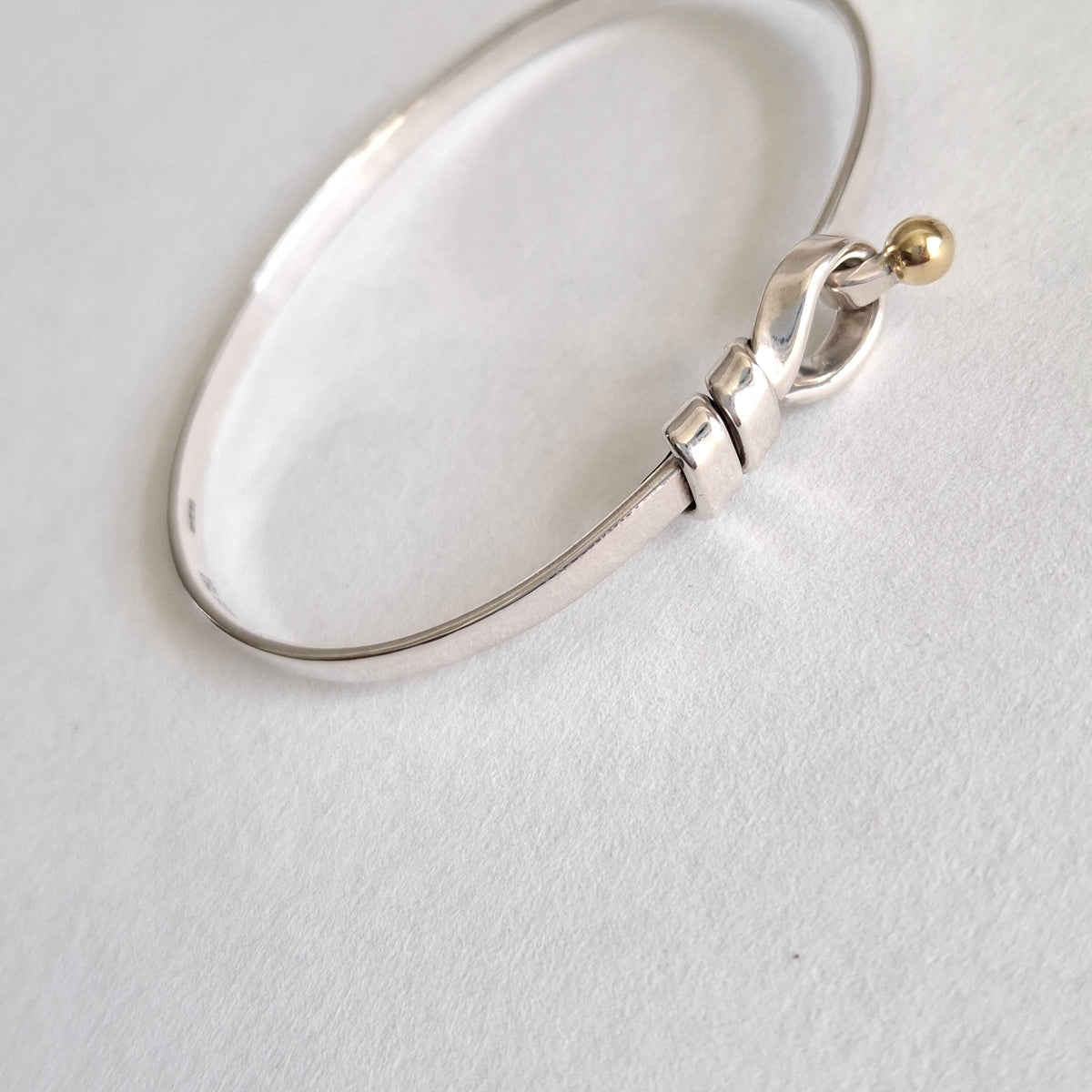 Vintage Tiffany & Co Love Knot Bracelet in Hallmarked Sterling Silver with 18k Gold Detail