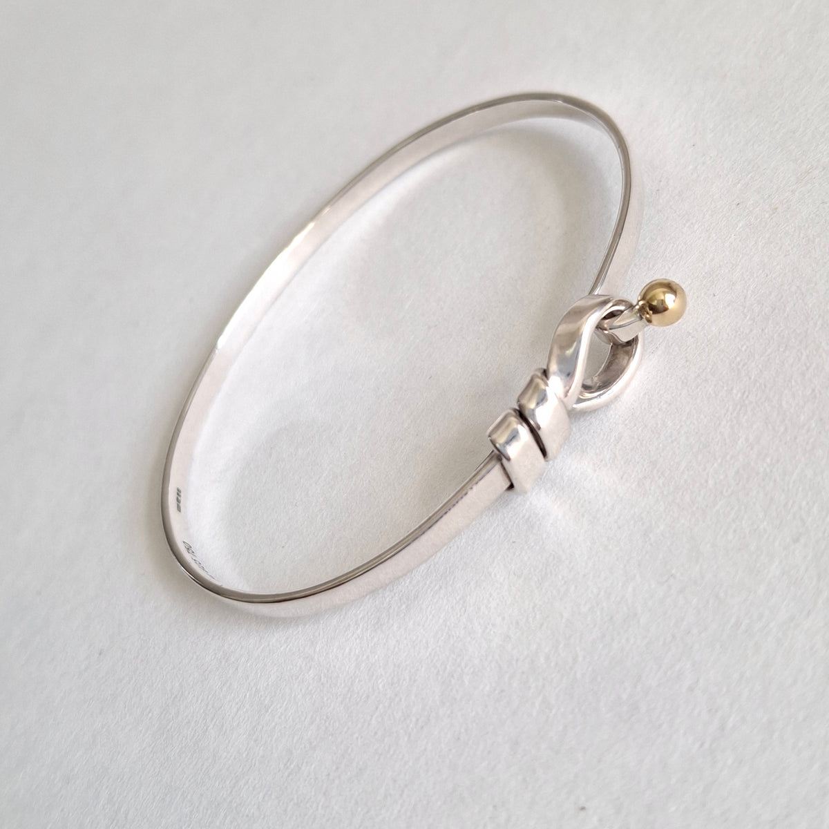 Vintage Tiffany & Co Love Knot Bracelet in Hallmarked Sterling Silver with 18k Gold Detail
