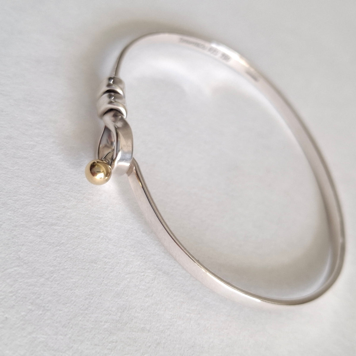 Vintage Tiffany & Co Love Knot Bracelet in Hallmarked Sterling Silver with 18k Gold Detail