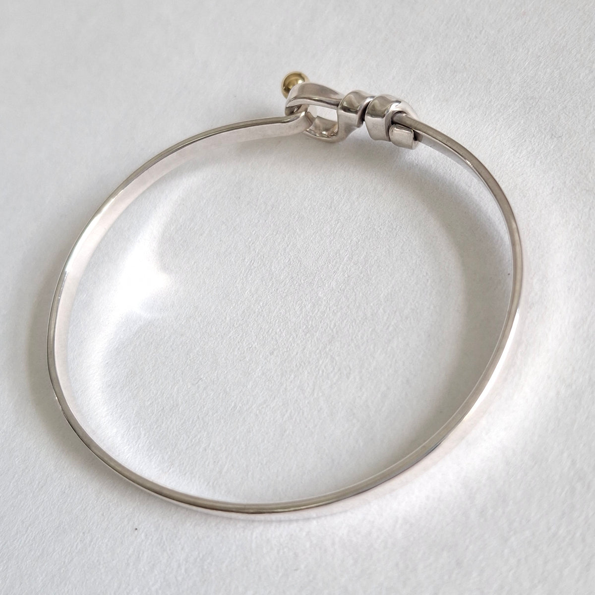 Vintage Tiffany & Co Love Knot Bracelet in Hallmarked Sterling Silver with 18k Gold Detail