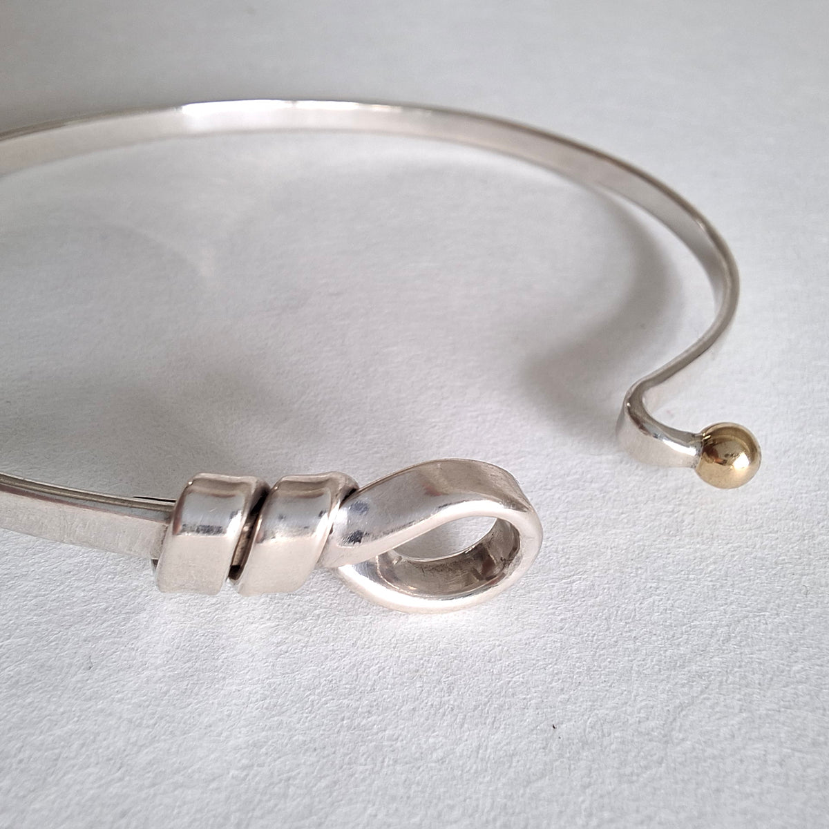 Vintage Tiffany & Co Love Knot Bracelet in Hallmarked Sterling Silver with 18k Gold Detail