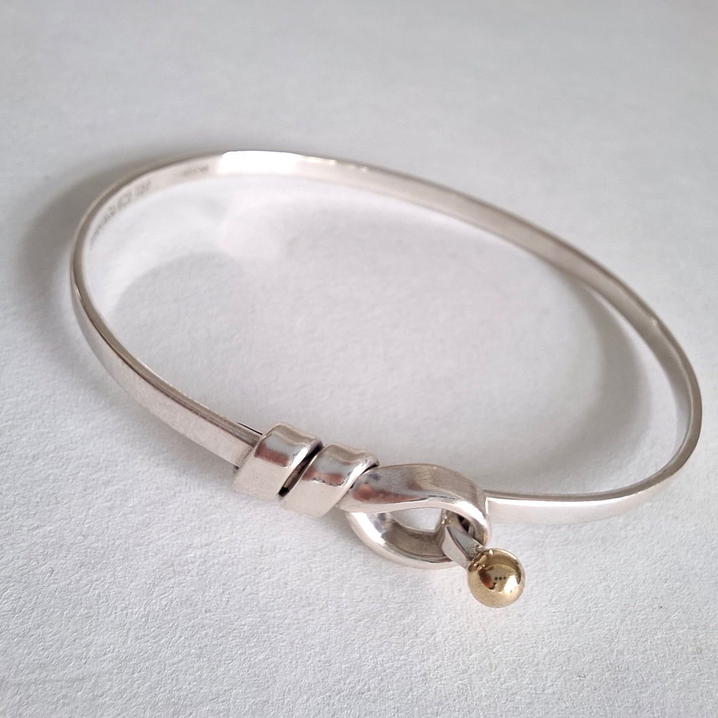 Vintage Tiffany & Co Love Knot Bracelet in Hallmarked Sterling Silver with 18k Gold Detail