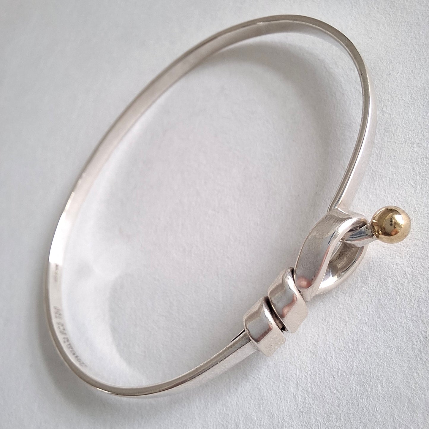 Vintage Tiffany & Co Love Knot Bracelet in Hallmarked Sterling Silver with 18k Gold Detail