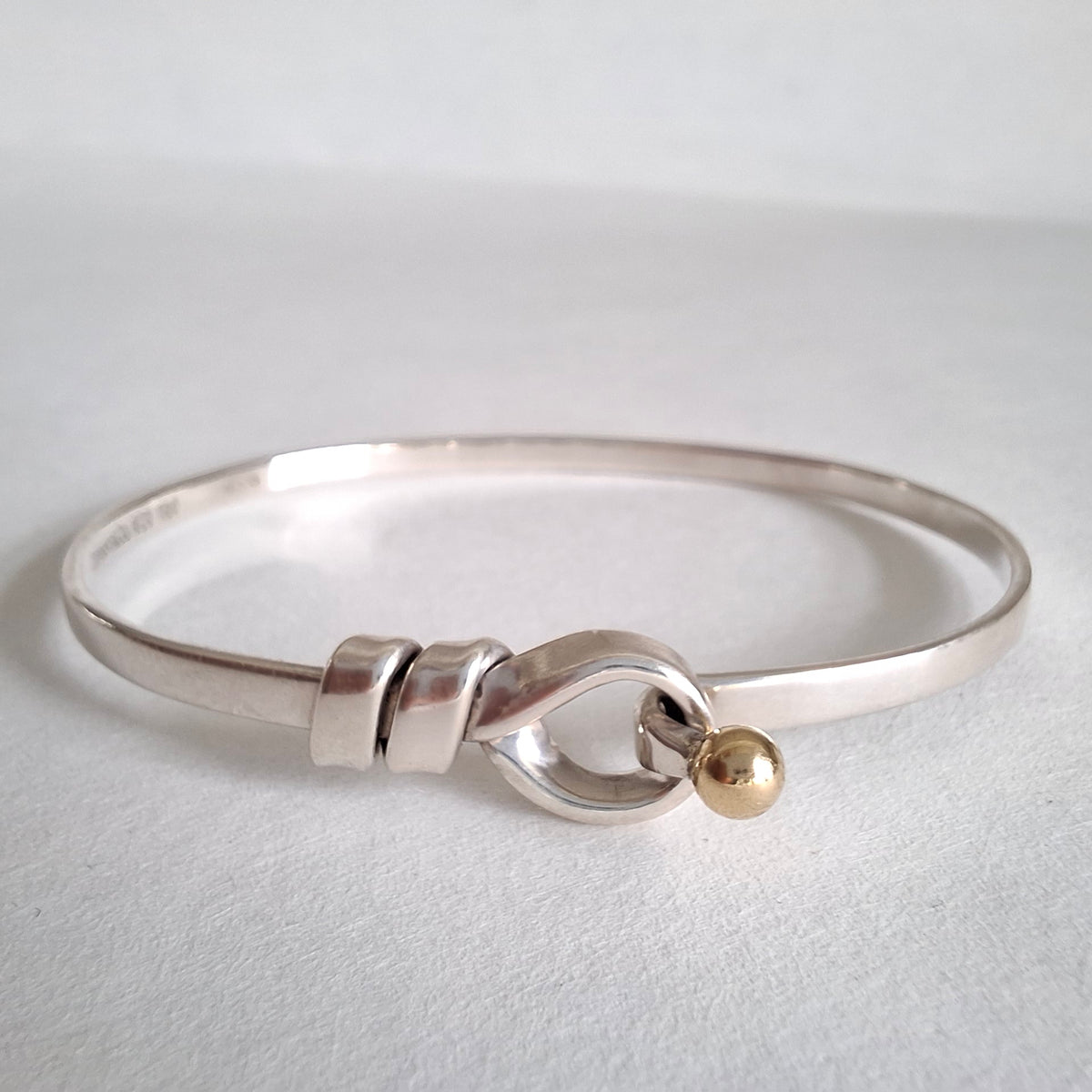 Vintage Tiffany & Co Love Knot Bracelet in Hallmarked Sterling Silver with 18k Gold Detail