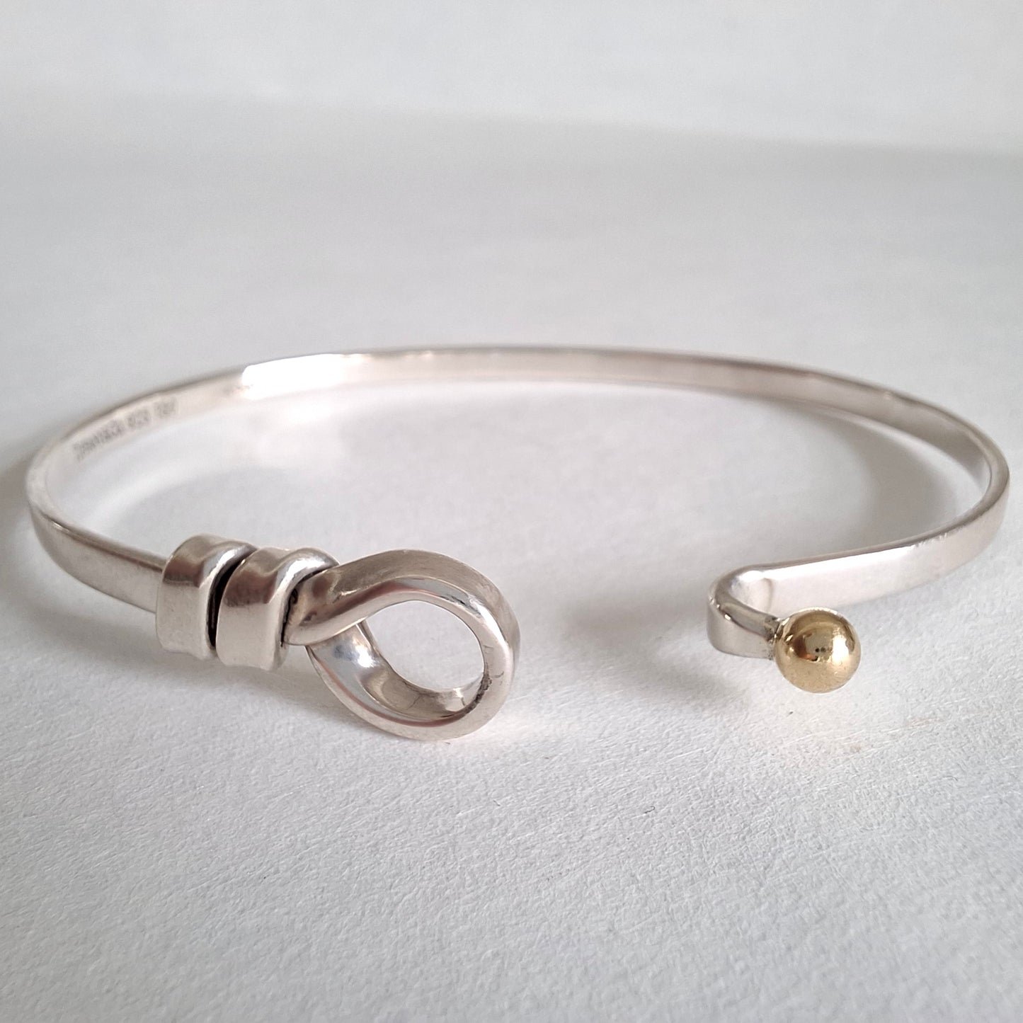 Vintage Tiffany & Co Love Knot Bracelet in Hallmarked Sterling Silver with 18k Gold Detail