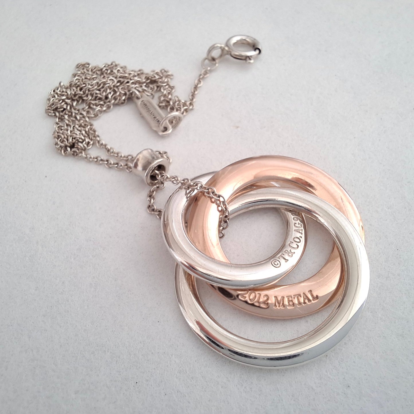 Tiffany & Co 1837 Triple Interlocking  Circles Pendant Necklace in Sterling Silver and Rubedo