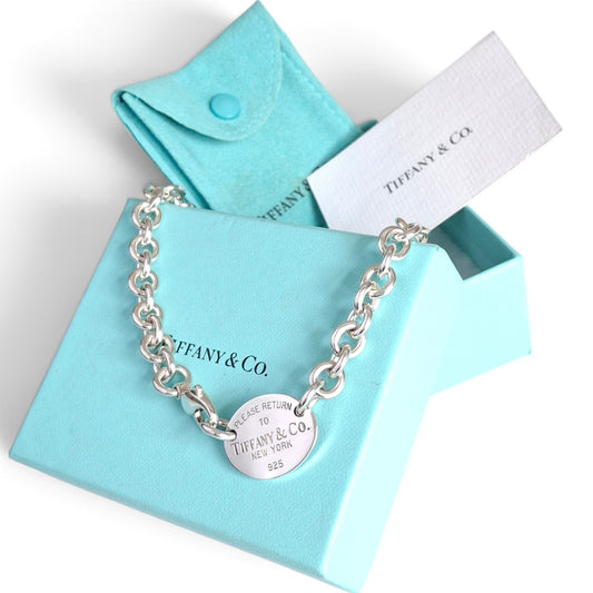 Return to Tiffany & Co 925 Sterling Silver Oval Tag Necklace with Pouch and Box