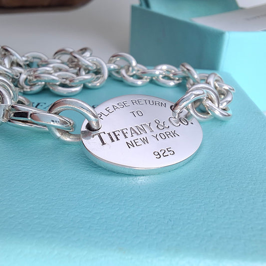 Return to Tiffany & Co 925 Sterling Silver Oval Tag Necklace with Pouch and Box