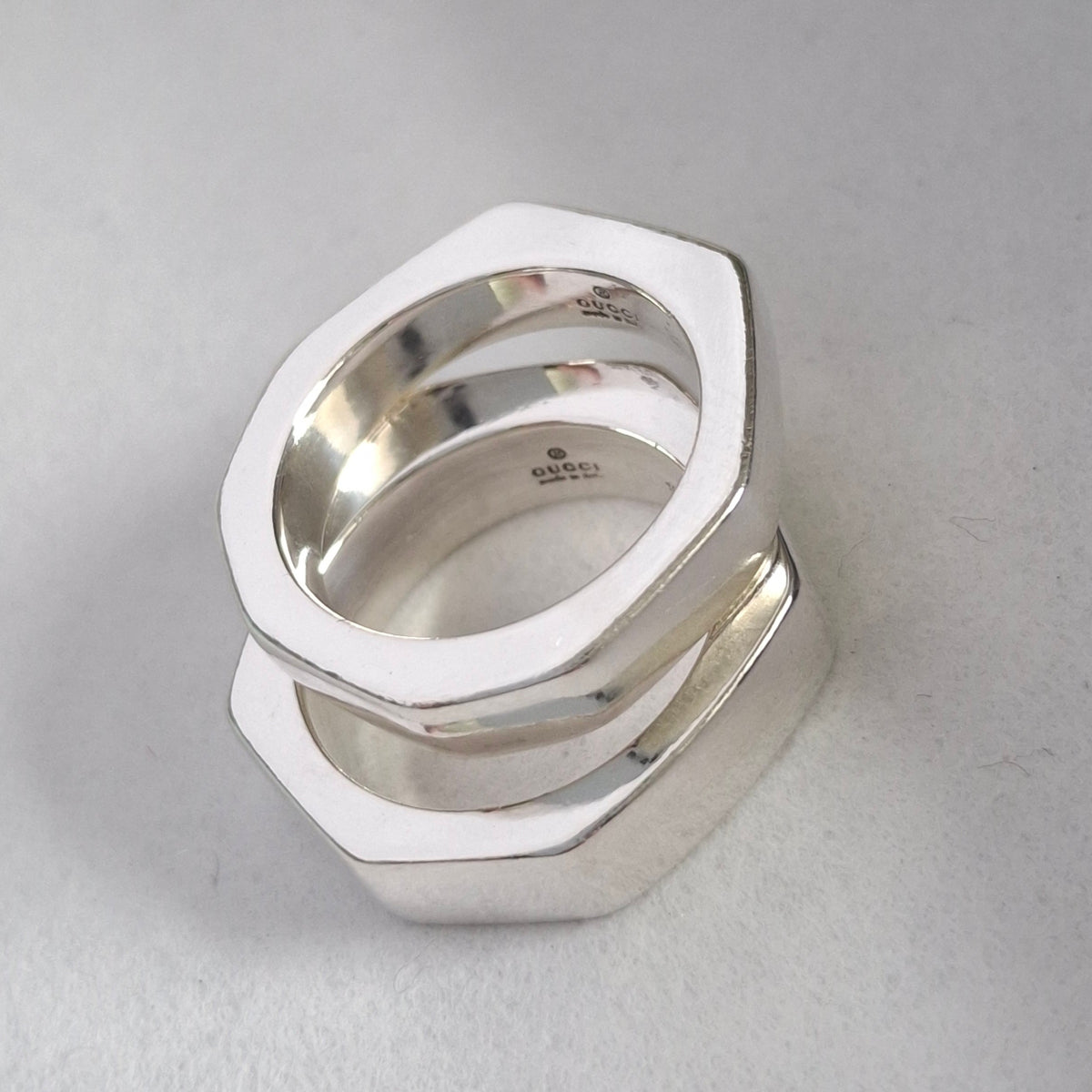 A Pair of Sterling Silver Gucci Hex Stacking Rings with Pouch and Box