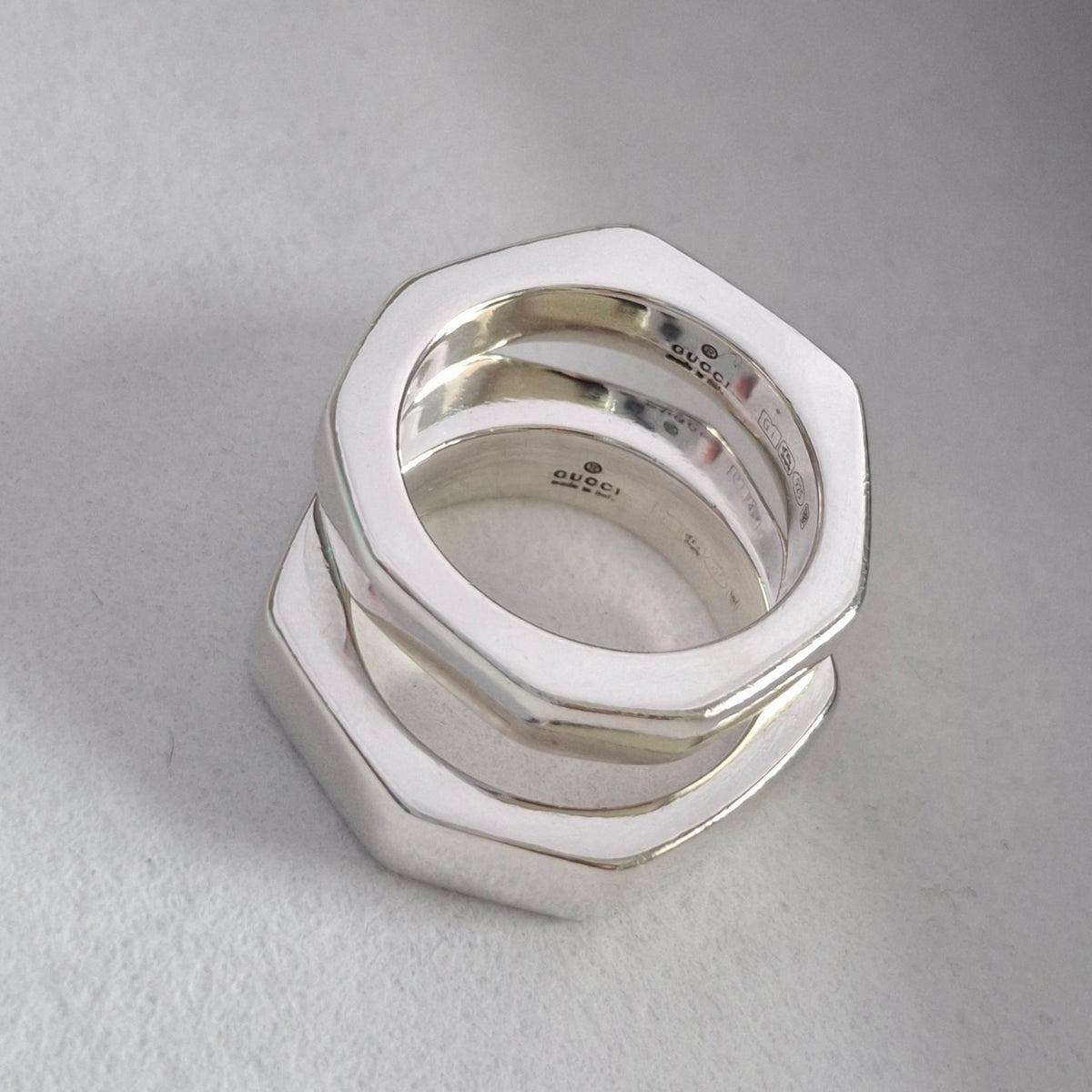 A Pair of Sterling Silver Gucci Hex Stacking Rings with Pouch and Box