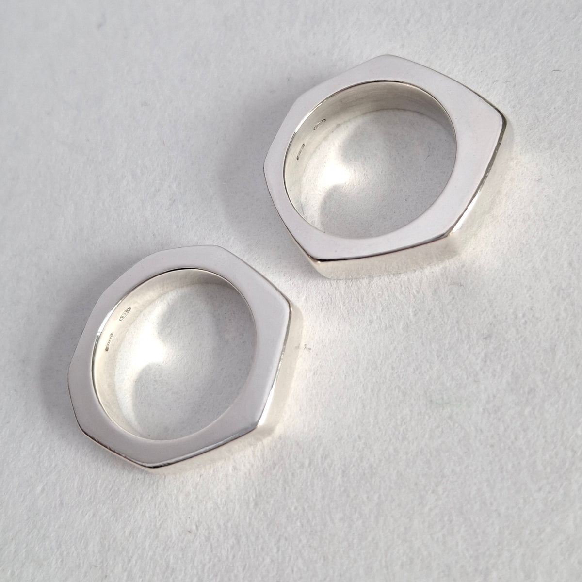 A Pair of Sterling Silver Gucci Hex Stacking Rings with Pouch and Box