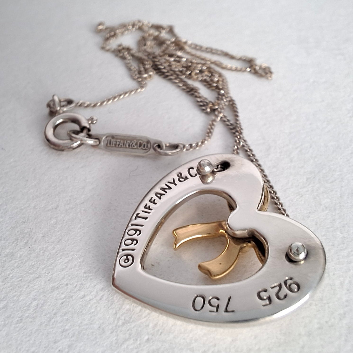 Vintage Tiffany & Co Sterling Silver Love Heart Pendant Necklace Inset with 18k Gold Ribbon Bow