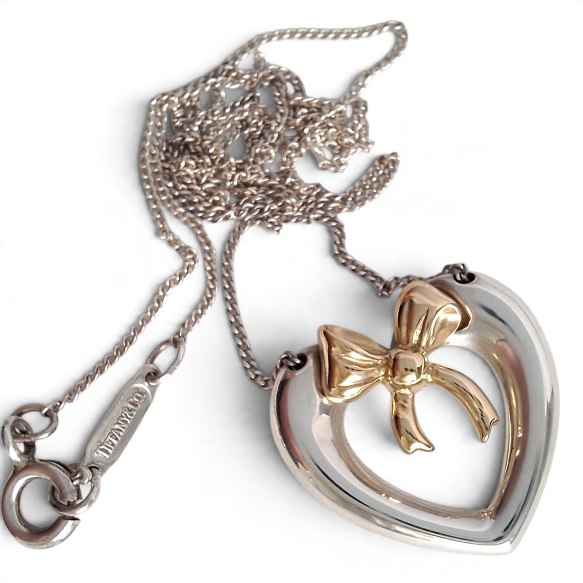 Vintage Tiffany & Co Sterling Silver Love Heart Pendant Necklace Inset with 18k Gold Ribbon Bow