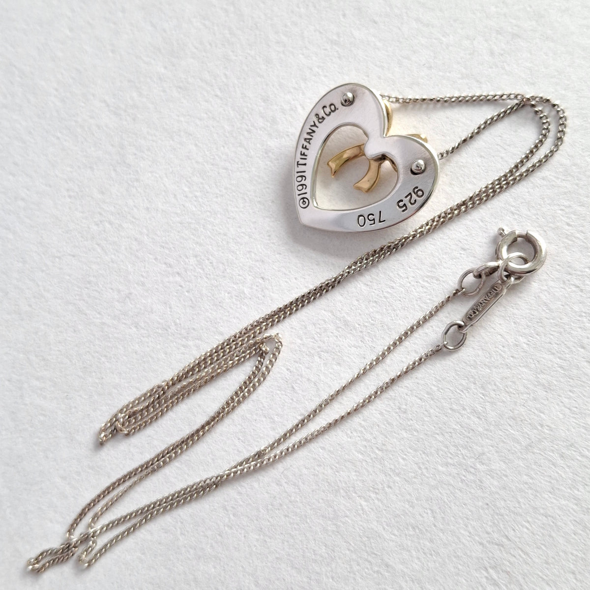 Vintage Tiffany & Co Sterling Silver Love Heart Pendant Necklace Inset with 18k Gold Ribbon Bow