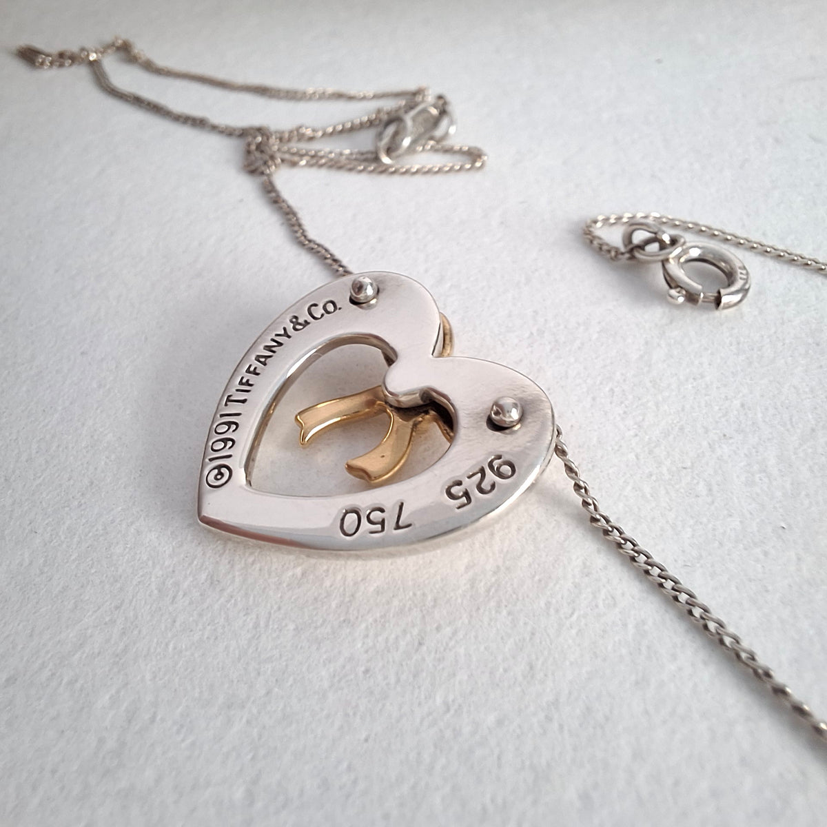 Vintage Tiffany & Co Sterling Silver Love Heart Pendant Necklace Inset with 18k Gold Ribbon Bow